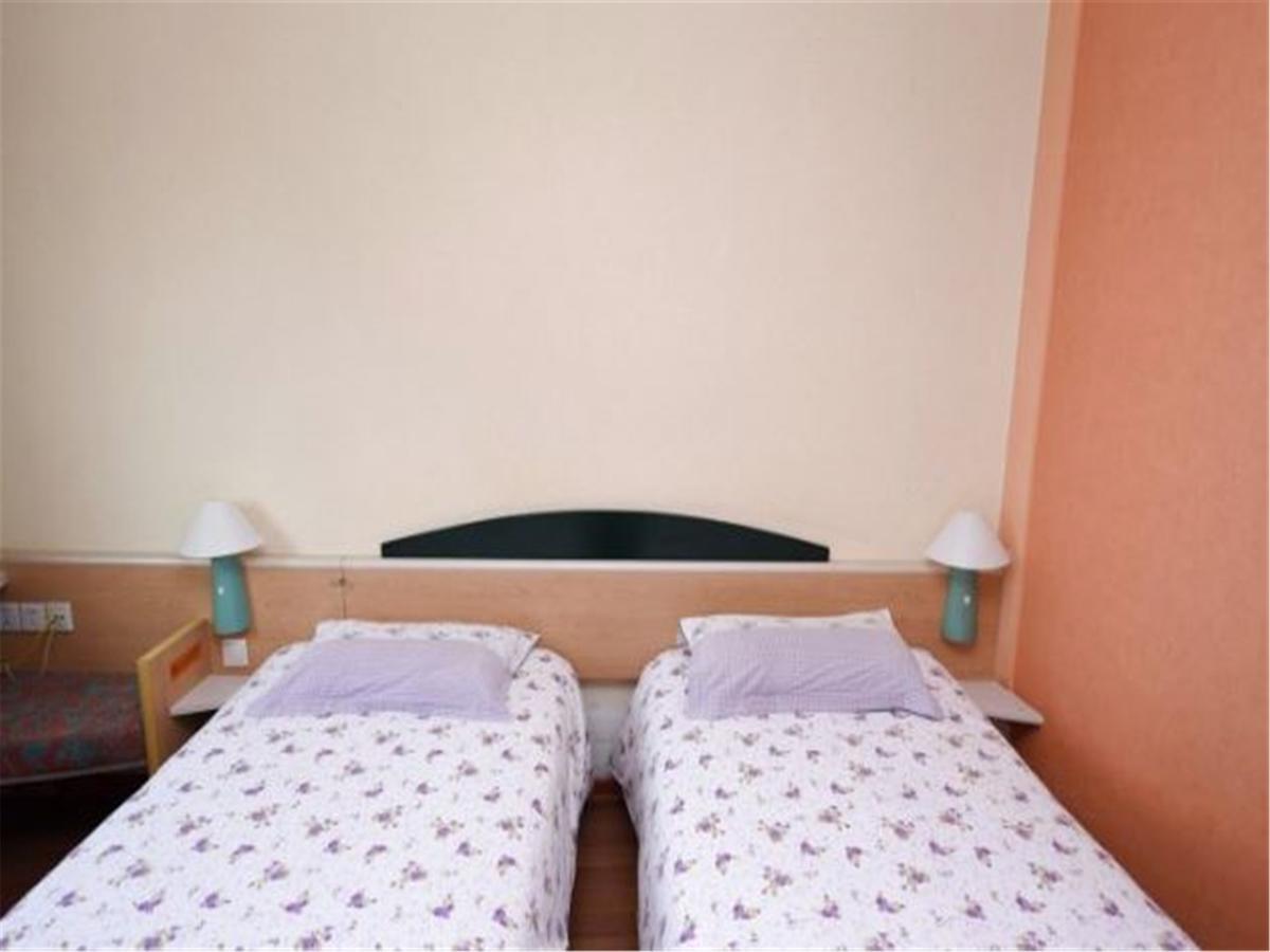 Motel Qingdao Jiaonan Renmin Road Business Street Dış mekan fotoğraf